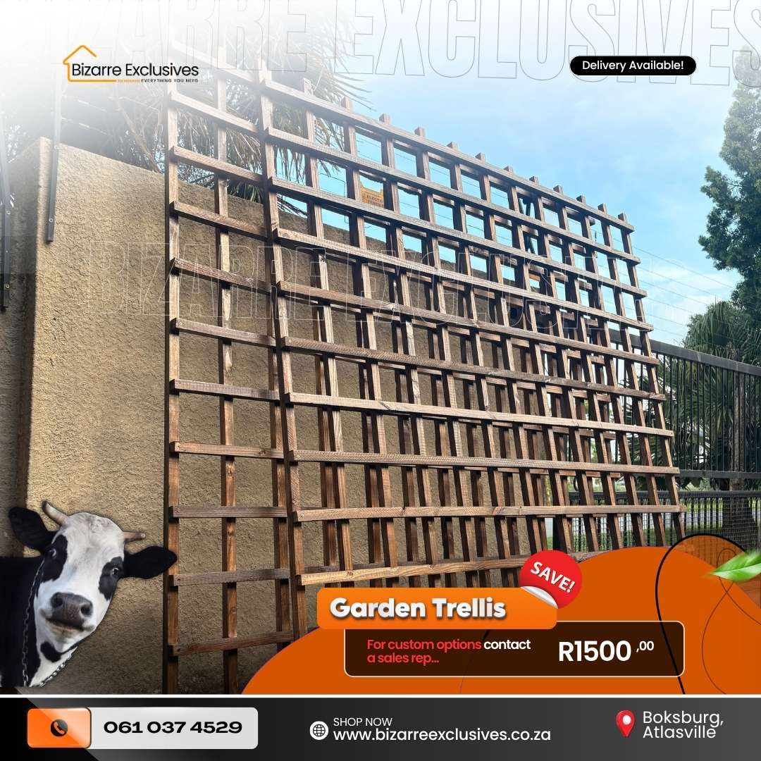 Custom handcrafted garden fence trellis made of solid wood treated for outdoors.